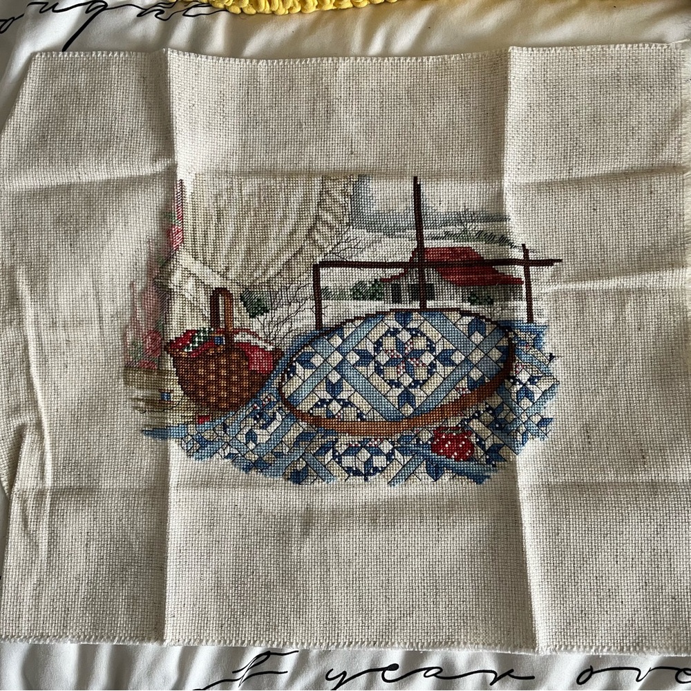 Handcrafted Cross-Stitch Quilt Design
